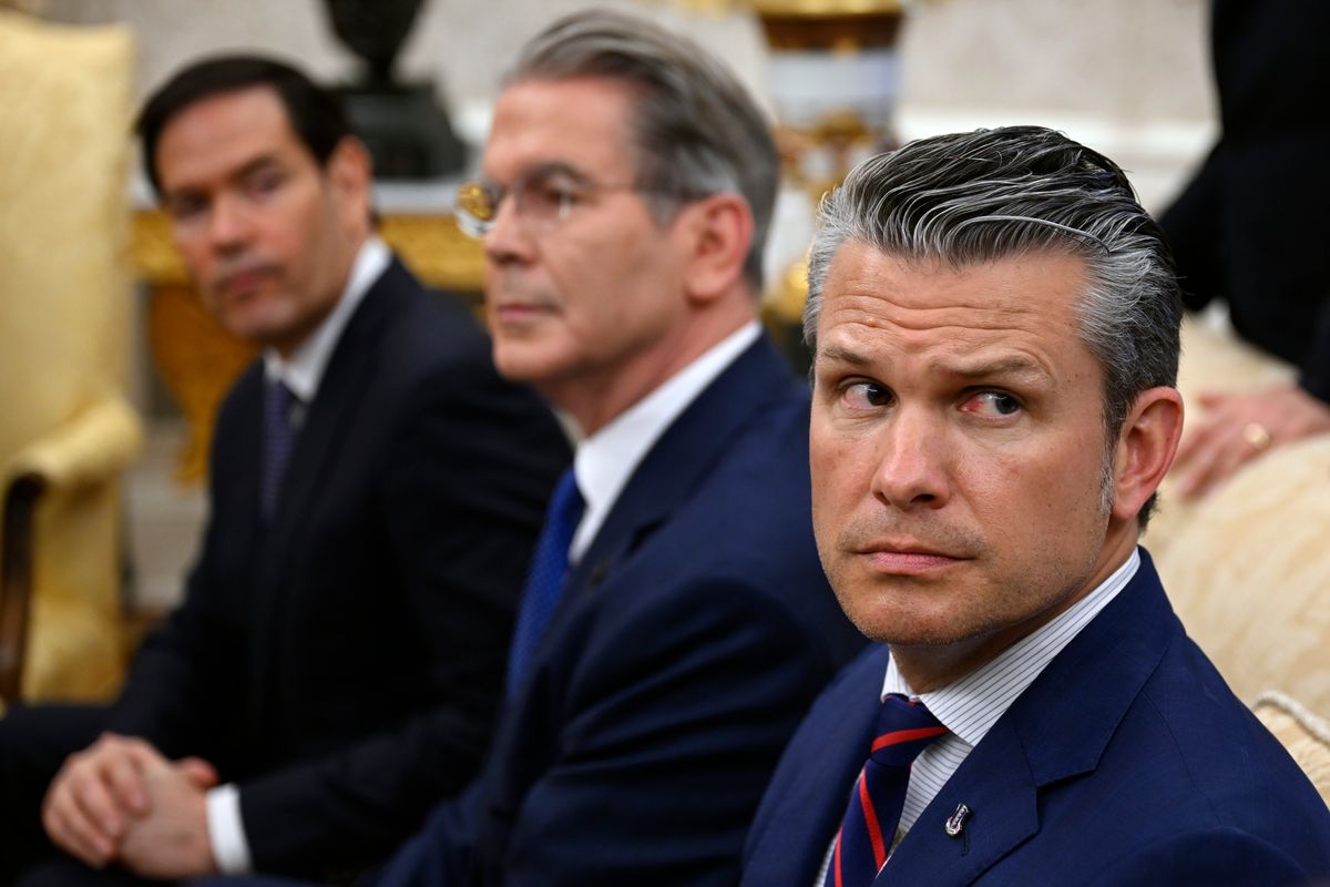 Defense Secretary Pete Hegseth, right, at the Pentagon on Tuesday with other senior Trump administration officials. MUST CREDIT: John McDonnell/For The Washington Post (John McDonnell/for The Washington Post)