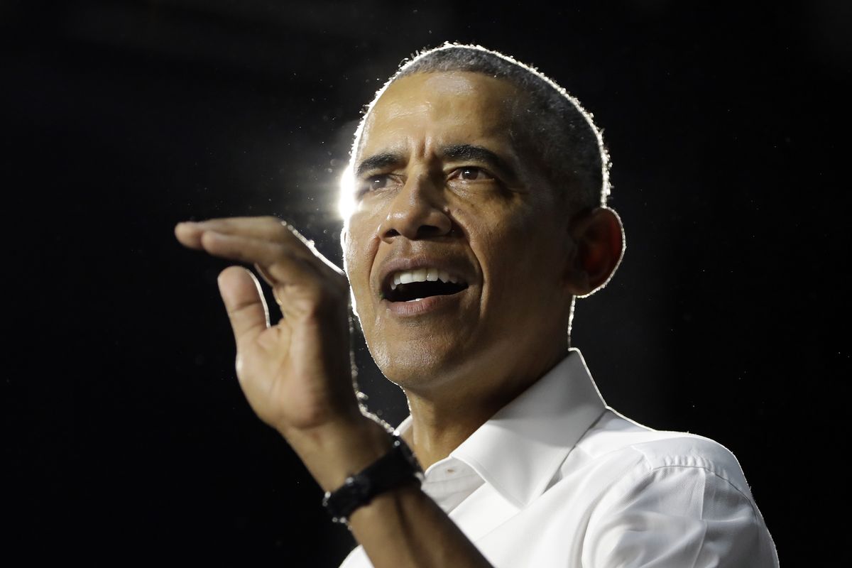 In this Nov. 2, 2018, file photo, former President Barack Obama speaks during a campaign rally for Democratic candidates in Miami. The former president on Thrusday released his brackets for the NCAA basketball tournaments. He has picked the Gonzaga Bulldogs to win the national championship.  (Lynne Sladky)