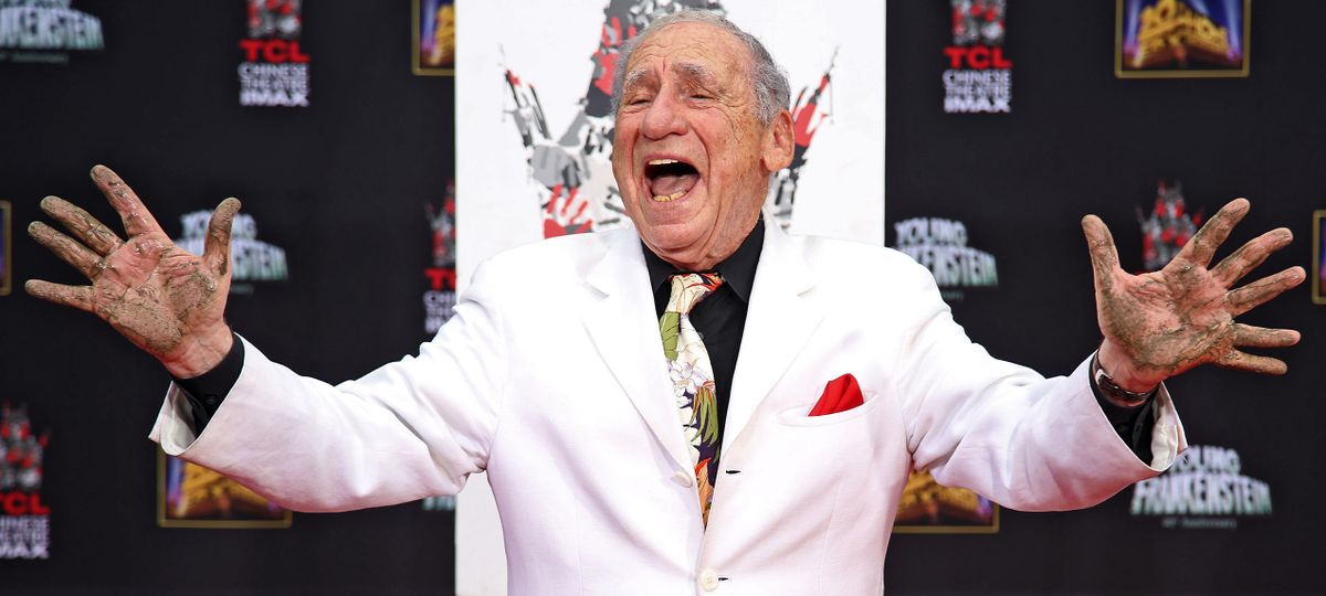 Mel Brooks displays his cement-covered hands, with his left hand sporting an extra finger, during his hand and footprint ceremony on the 40th anniversary of the movie “Young Frankenstein” in front of the TCL Chinese Theatre in the Hollywood section of Los Angeles on Monday. (Associated Press)