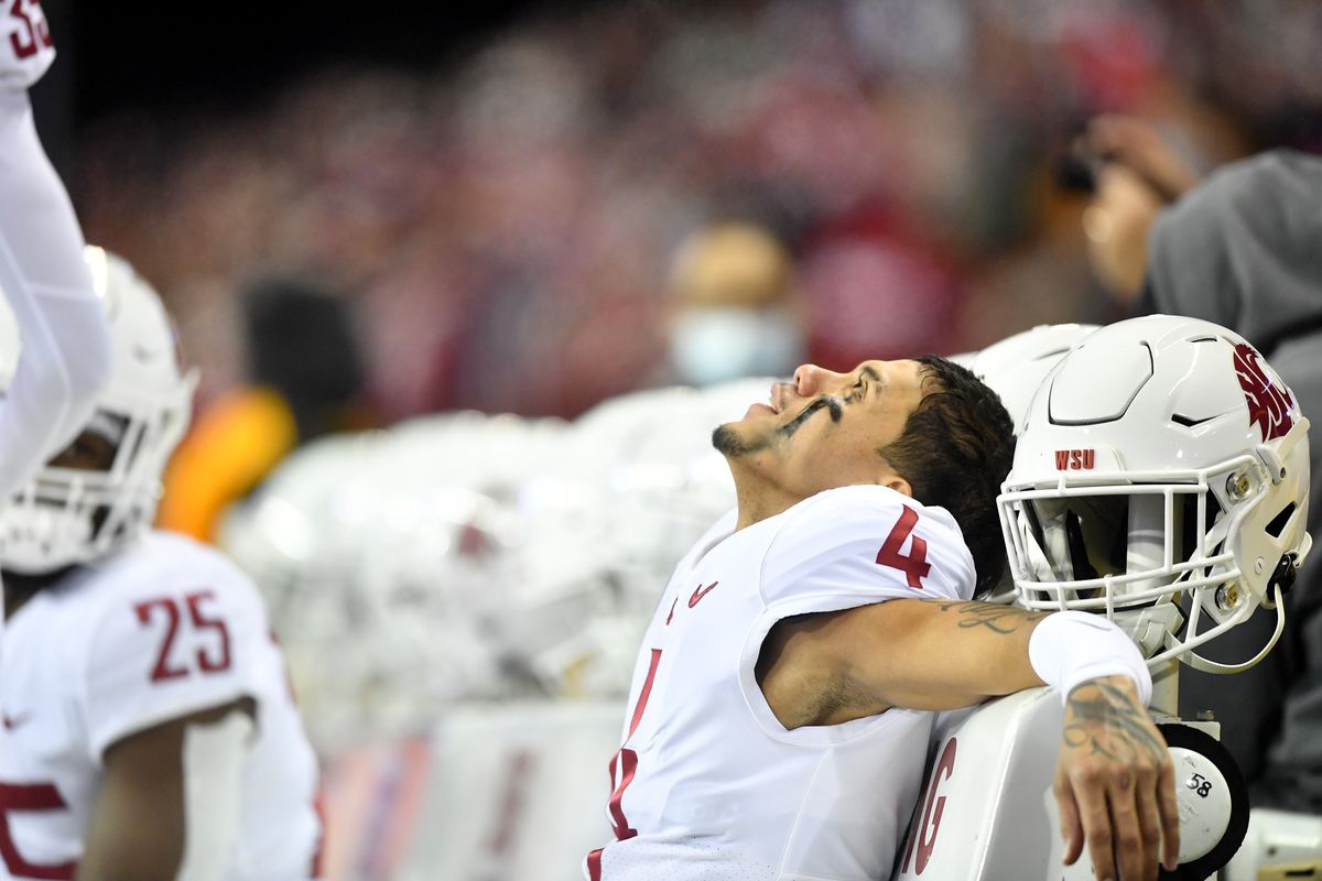 Quarterback Jayden de Laura reacts as it became evident Washington State would defeat Washington in Friday’s Apple Cup.  (Tyler Tjomsland/The Spokesman-Review)