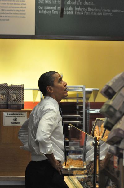 President Obama considers his choices at a Pioneer Square cafe, Aug. 17, 2010 (Jim Camden/Spokesman-Review)