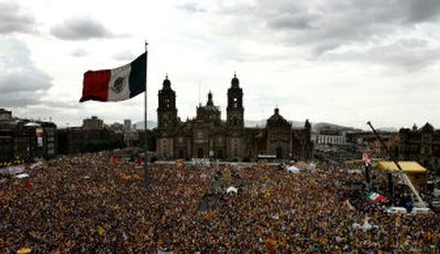 
A rally in support of defeated presidential candidate Andres Manuel Lopez Obrador drew thousands Saturday in Mexico City. 
 (Associated Press / The Spokesman-Review)