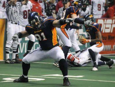 
Shock's Harrison Nikoloa celebrates a Spokane fumble recovery with a dance early in the first quarter on Saturday.The Spokesman Review
 (DAN PELLE The Spokesman Review / The Spokesman-Review)