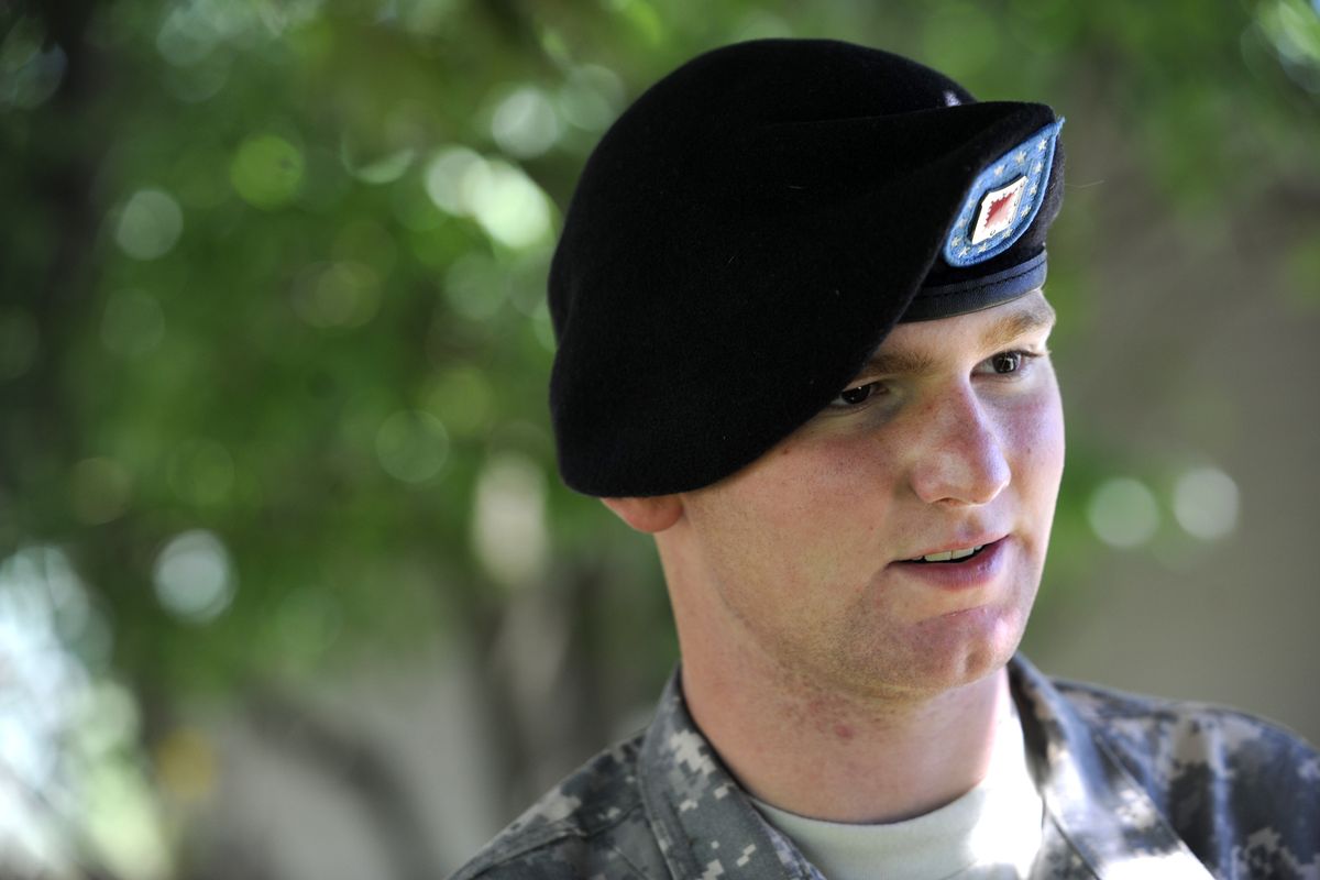 Pfc. George Stratton III, of Post Falls, stands in his parents’ backyard Wednesday during  a two-week leave from the Army.  He is considered fully recovered from being shot by Maj. Nidal Malik Hassan at Fort Hood, Texas, in November.  (Jesse Tinsley)