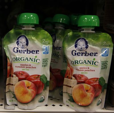Gerber organic baby food pouches are seen on a shelf in the baby food aisle in City Target on Thursday in downtown Los Angeles. Organic baby food often is packaged in pouches, an industry innovation popular in its own right. (Associated Press)