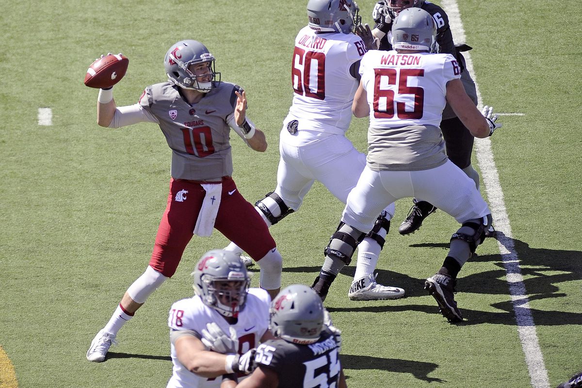 Washington State quarterback Trey Tinsley sits in the pocket to deliver a pass during the Crimson and Gray Game on Saturday at Joe Albi Stadium. (James Snook / For The SR)