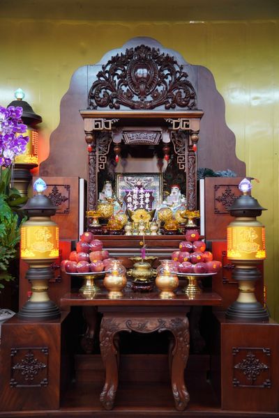 Apples are shown as part of a shrine at the Thu Duc Wholesale Market in Ho Chi Minh City in March.  (Andrew Perdue)