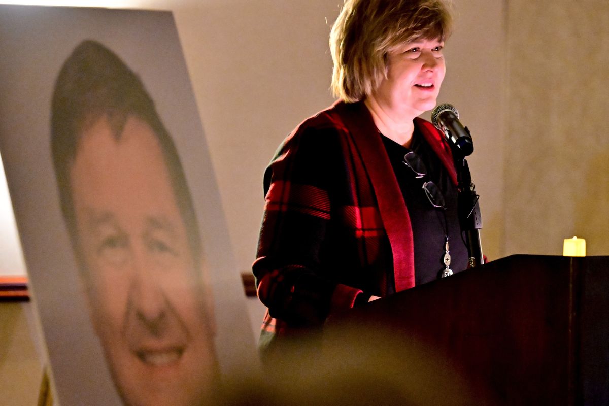 Doug Brant’s sister, RN Trudy Dant, smiles as she speaks of her brother’s love for music and helping others during a vigil for Brant, the home nurse who was shot and killed earlier this month, on Wednesday, Dec. 21, 2022, at the Double Tree by Hilton Hotel in Spokane, Wash.  (Tyler Tjomsland/The Spokesman-Review)