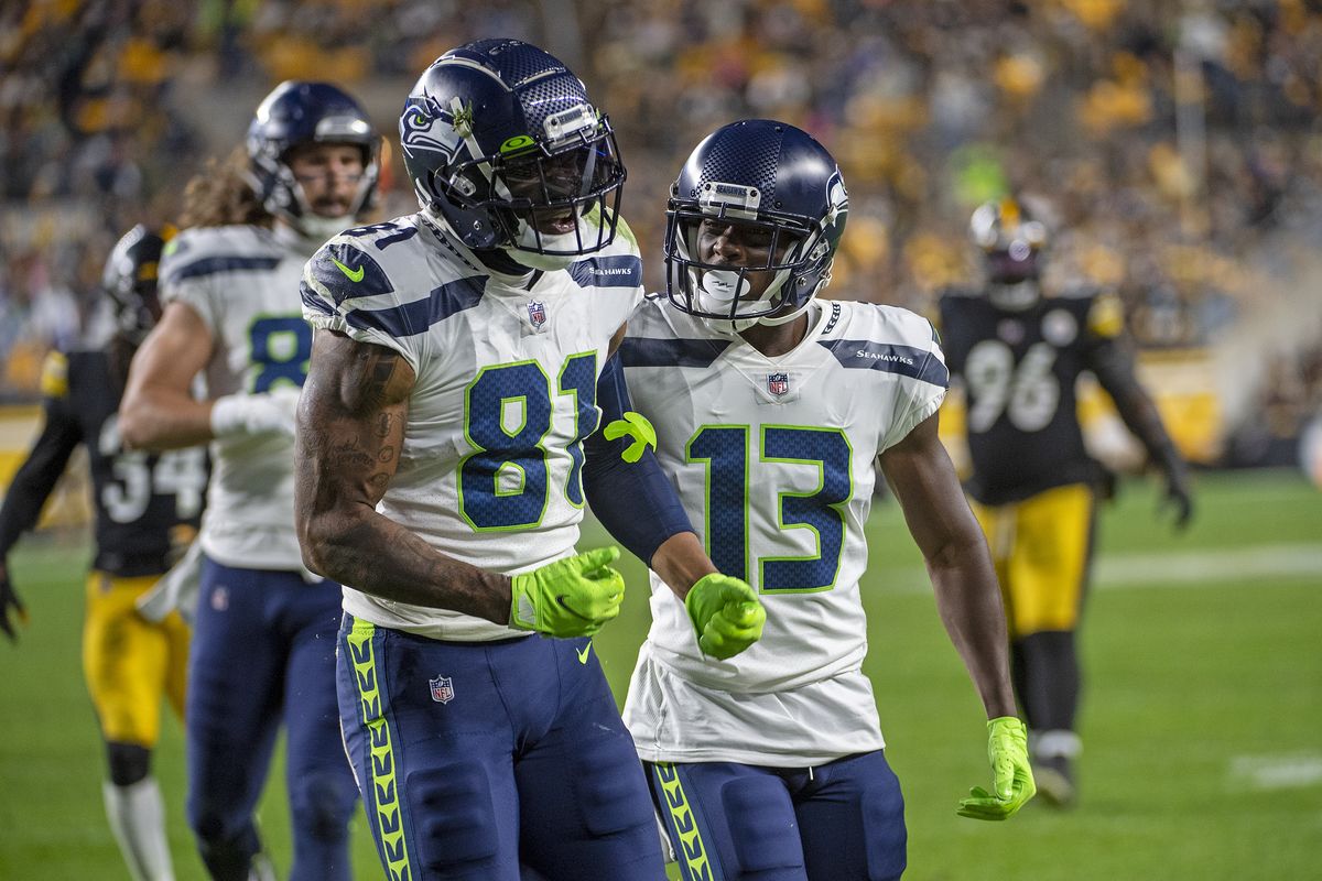 Seattle tight end Gerald Everett, left, reacts after a catch against the Pittsburgh Steelers last Sunday in Pittsburgh.  (Justin Berl)