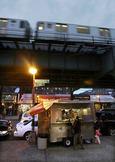 
Tacos Guicho, a food cart operated by Lety Ramos and Isaura Tapia, is considered one of the best spots for Mexican tacos in Jackson Heights. Art, decor, culture and especially cuisine with a Latin American flair can be found in several buroughs in New York City.
 (Associated Press photos / The Spokesman-Review)