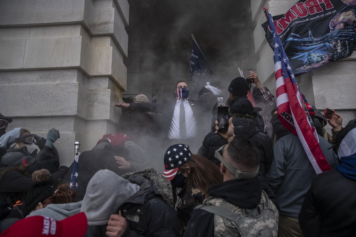 Demonstrators attempt to breach the U.S. Capitol on Jan. 6, 2021 in Washington, DC. Dozens of federal prosecutors have been fired or demoted during President Donald Trump’s second term after working on Jan. 6 cases  (Victor J. Blue/Bloomberg)