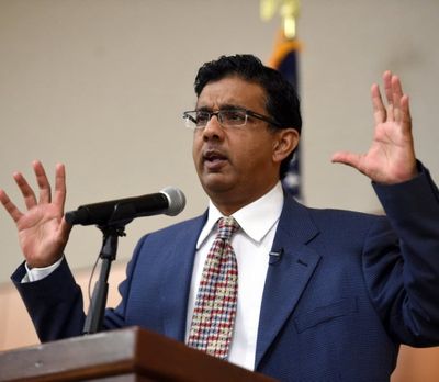Dinesh D'Souza, an Indian-American political commentator, bestselling author and documentary filmmaker, speaks at Gonzaga University, Wednesday. (Colin Mulvany/SR)