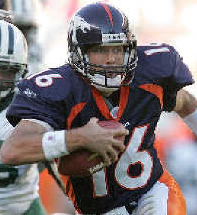 
Jake Plummer leads Denver into Dallas. 
 (Associated Press / The Spokesman-Review)