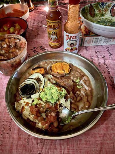 Dried beans simmered in a slow cooker were the foundation to a satisfying supper by the campfire on a recent visit to Palm Springs. (Leslie Kelly)