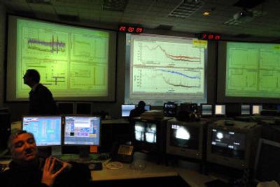 
Computer monitoring systems track the Laser Interferometer Gravitational-Wave Observatory project's performance and data Tuesday at the Hanford site. 
 (The Spokesman-Review)