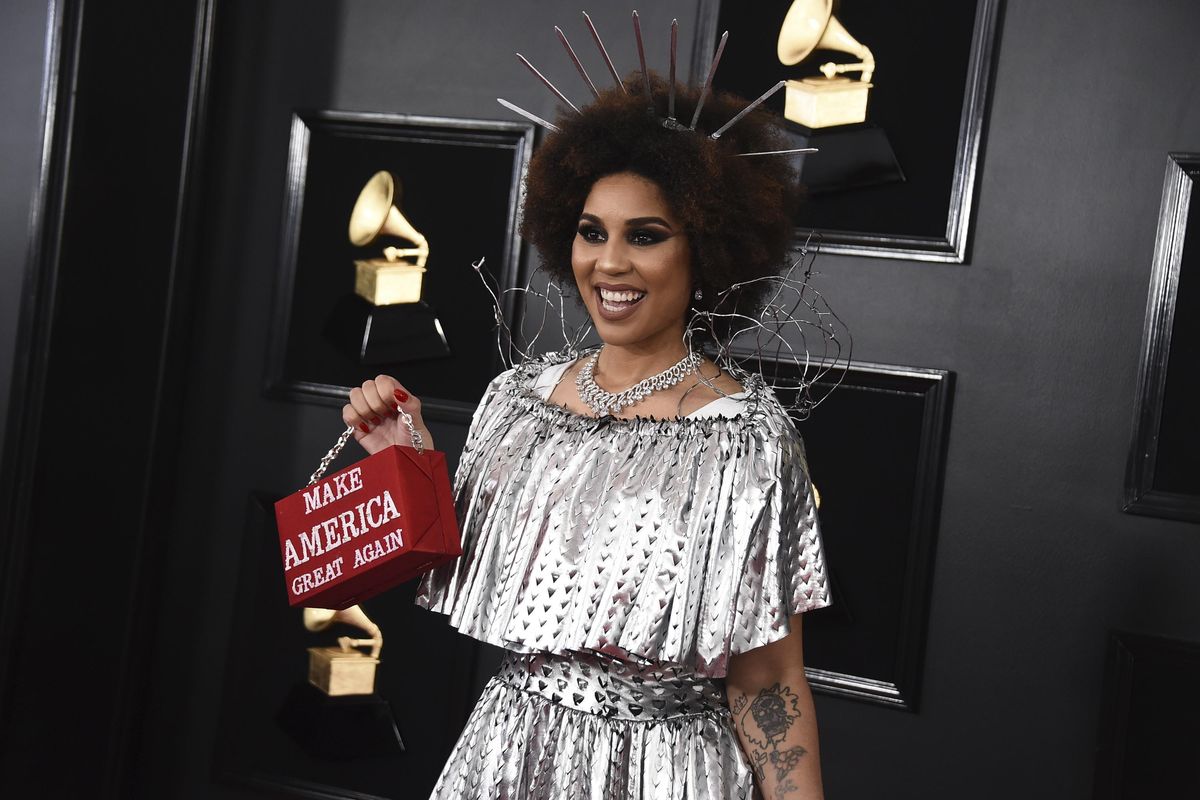 Joy Villa holds a purse that reads "Make America Great Again" at the 61st annual Grammy Awards at the Staples Center on Sunday, Feb. 10, 2019, in Los Angeles. (Jordan Strauss / Associated Press)