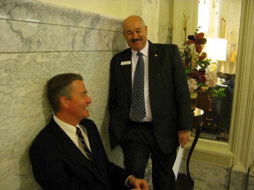 Senate President Pro-Tem Bob Geddes, right, shares a laugh with Lt. Gov. Brad Little, left, before the Senate starts its session on Monday morning. (Betsy Russell)