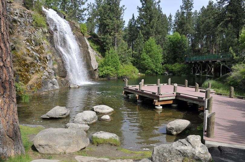 The pond and landscaped area known as Mirabeau Springs in Mirabeau Point Park was once the tiger enclosure at Walk in the Wild Zoo, which closed in the 1990s. The area was reclaimed as the park, which sits behind the YMCA and CenterPlace in Spokane Valley. (Jesse Tinsley)