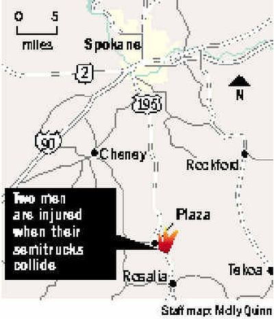 
A driver of a tractor-trailer rig is airlifted to a Spokane hospital after a head-on crash with another semitruck on U.S. Highway 195 near Plaza on Monday morning. 
 (Brian Plonka / The Spokesman-Review)