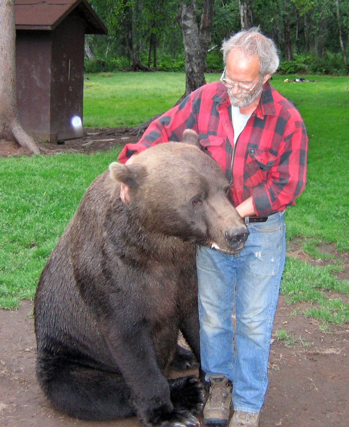 This undated photo released by the Alaska Department of Fish and Game shows Charlie Vandergaw with a brown bear. (The Spokesman-Review)