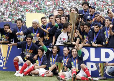 Mexico players celebrate after defeating the U.S. 5-0 in the CONCACAF Gold Cup soccer final. (Associated Press / The Spokesman-Review)