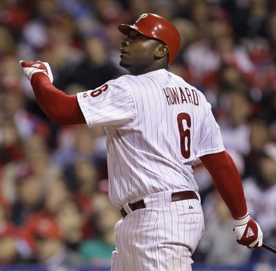 Phillies slugger Ryan Howard watches his three-run home run in the fourth inning.  (Associated Press / The Spokesman-Review)