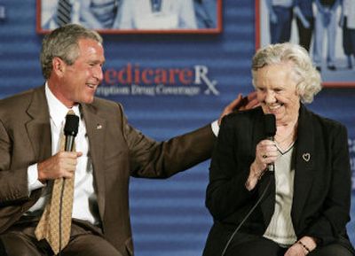 
President Bush shares a moment with senior citizen Myrtle Jones  during a conversation on Medicare  in Rancho Cucamonga, Calif., Monday. 
 (Associated Press / The Spokesman-Review)
