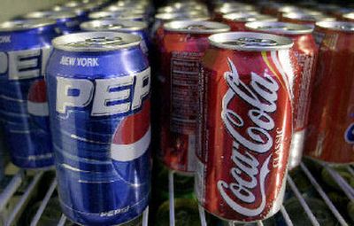 
Thought bitter rivals, Pepsi and Coke worked together to thwart an alleged theft of trade secrets.. 
 (Associated Press / The Spokesman-Review)