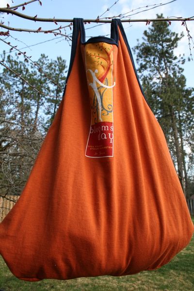 Turn an old T-shirt into a tote bag and use it at the grocery store to reduce the use of paper or plastic bags. (Megan Cooley)