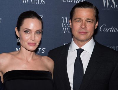 Angelina Jolie Pitt and Brad Pitt attend an awards ceremony at the Museum of Modern Art in New York in 2015 in this file photo. (Charles Sykes / Associated Press)