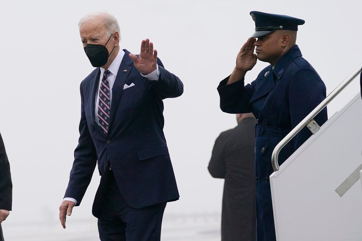 President Joe Biden waves as he steps off Air Force One upon arrival, at John F. Kennedy Airport, Thursday, Feb. 3, 2022, in the Queens Borough of New York. (Alex Brandon)