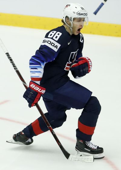 Patrick Kane of the United States celebrates after scoring his sides winning goal during the Ice Hockey World Championships quarterfinal match between the United States and Czech Republic at the Jyske Bank Boxen arena in Herning, Denmark, Thursday, May 17, 2018. (Petr David Josek / Associated Press)