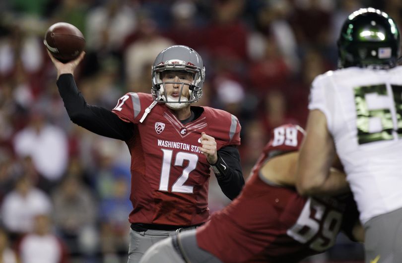 WSU quarterback Connor Halliday will work on looking for open receivers rather than big yardage. (Associated Press)