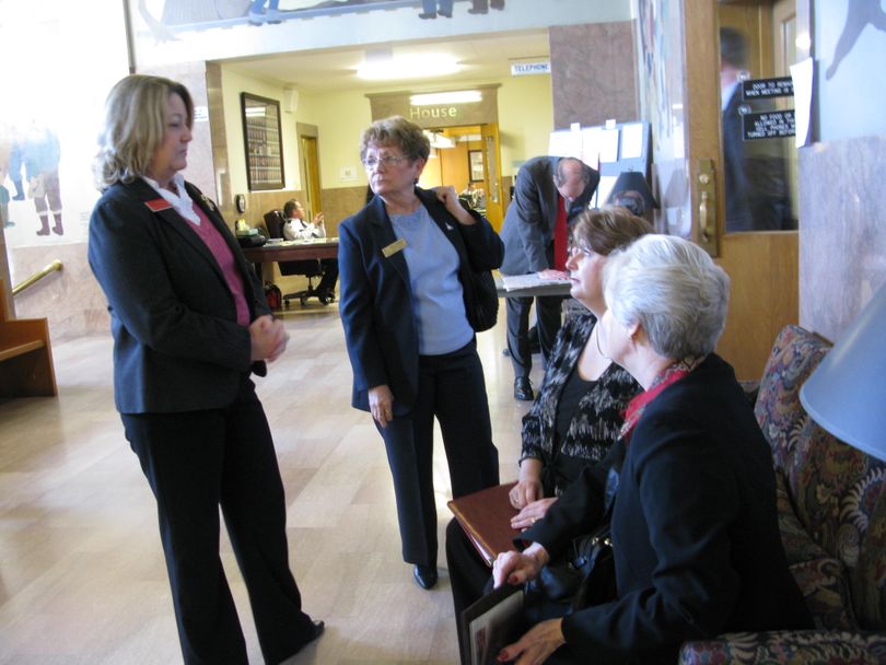 Members of the Idaho Women's Commission plan for their last meeting, after the Joint Finance-Appropriations Committee eliminated their funding on Monday. From left are director Kitty Kunz, and commissioners Dawn Shepherd of Riggins, Sonna Lynn Fernandez of Nampa, and Fran Dingel of boise. (Betsy Russell / The Spokesman-Review)