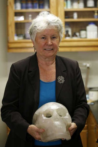 
Left: Anthropologist Jane MacLaren Walsh poses with a 31-pound, 10-inch high crystal skull, believed to be made in Mexico in the 1950s, at Smithsonian's Museum of Natural History  in Washington, D.C. Associated Press
 (Associated Press / The Spokesman-Review)