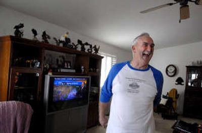 
Golden Spike Estates resident Howard West says Thursday he wouldn't mind if his neighbors show up at his door to watch the Super Bowl on Sunday. He is one of the few Golden Spike residents who will be able to see the Fox-broadcast game because most get their TV service from Time Warner. 
 (Kathy Plonka / The Spokesman-Review)