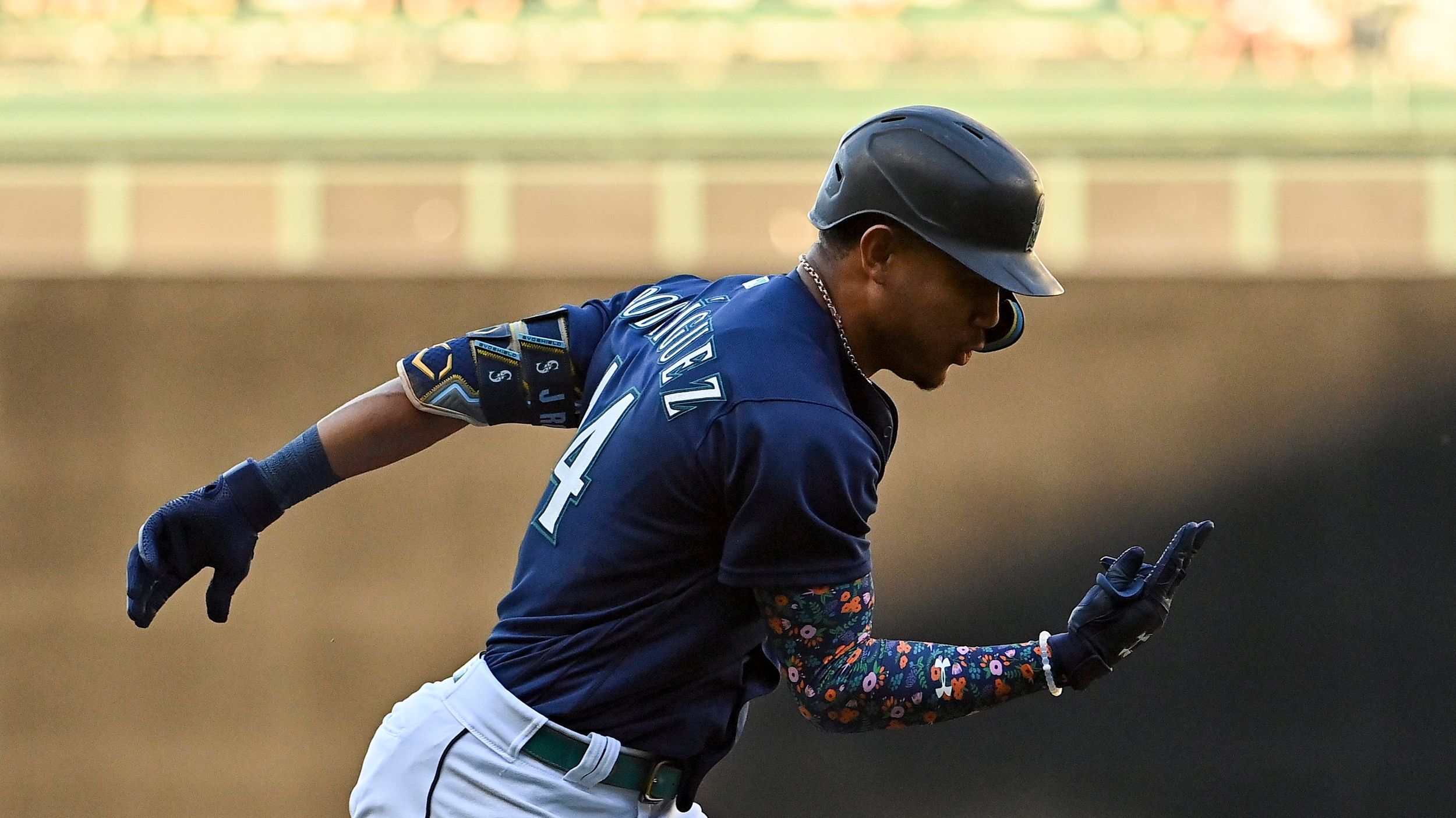 Puerto Rico's Francisco Lindor singles, then comes all the way home after a  costly error by Julio Rodriguez