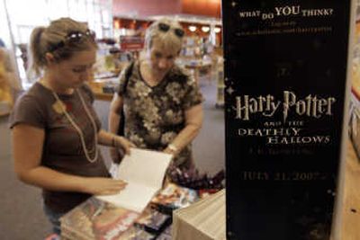 
Rebecca Bawal, 21, left, and her grandmother Lorraine Nelson, right, view Harry Potter merchandise at a Borders store in Novi, Mich. Associated Press
 (Associated Press / The Spokesman-Review)