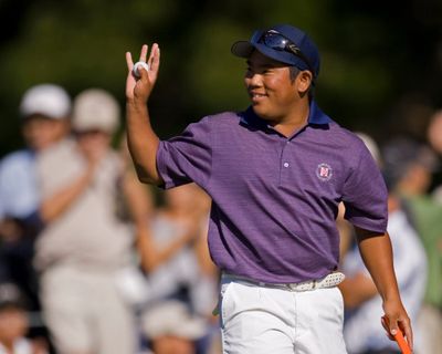 Tadd Fujikawa, 18, waves to the gallery at the Sony Open golf tourney.  (Associated Press / The Spokesman-Review)