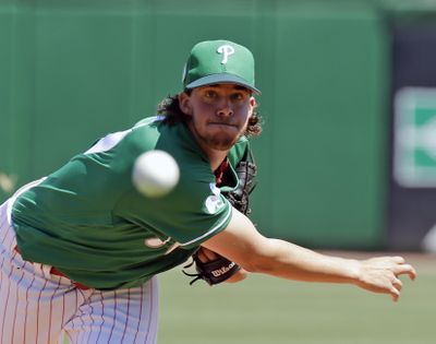 In this March 17, 2017, file photo, Philadelphia Phillies starting pitcher Aaron Nola throws against the Toronto Blue Jays in the first inning of a spring training baseball game, in Clearwater, Fla. Nola was headed toward ace status until an elbow injury put everything on hold. (John Raoux / Associated Press)