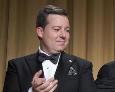In this April 27, 2013 photo, Ed Henry, Chief White House Correspondent for Fox News, applauds during the White House Correspondents' Association Dinner in Washington. (Carolyn Kaster)