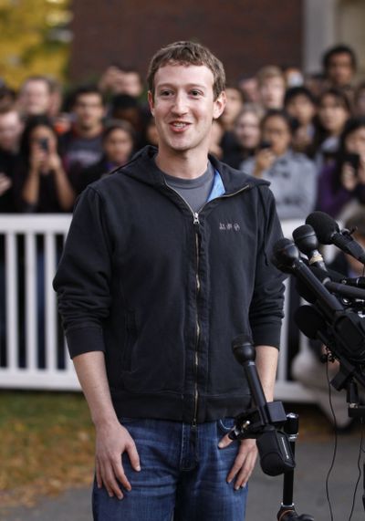 Facebook creator and CEO Mark Zuckerberg takes questions from members of the media at Harvard University on Monday. (Associated Press)