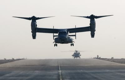 A V-22 Osprey tilt-rotor aircraft lands at Asad air base after a mission in the western Iraqi desert in 2008. Ospreys will fly in Afghanistan this fall despite acknowledged shortcomings and safety concerns.  (Associated Press / The Spokesman-Review)