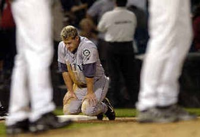 
 Mariners' Bret Boone pauses after being thrown out at third for the final out of the game.
 (Associated Press / The Spokesman-Review)