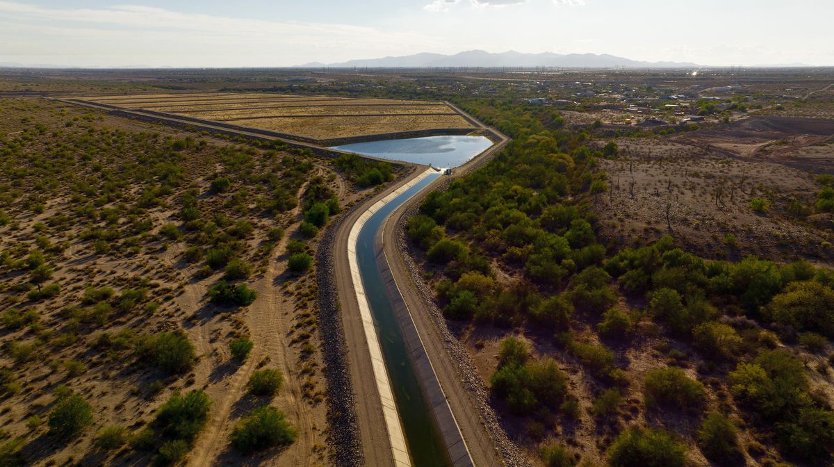 Colorado River water flows into the Agua Fria groundwater recharge basins, or groundwater recharge facilities, in Peoria, Arizona.   (Albert Brave Tiger Lee/Los Angeles Times/TNS)