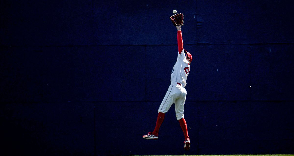 Spokane center fielder Benny Montgomery leaps for a catch Tuesday against Everett.  (KATHY PLONKA/THE SPOKESMAN-REVIE)