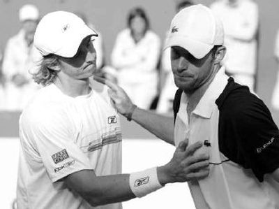 
Andy Roddick's first-round French Open loss came at the hands of Russia's Igor Andreev, left. 
 (Associated Press / The Spokesman-Review)