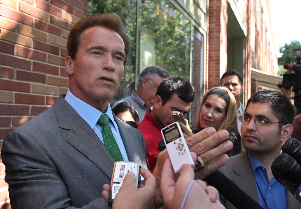 Schwarzenegger speaks with reporters at a prayer breakfast in Sacramento, Calif., on Thursday. (Rich Pedroncelli / The Spokesman-Review)
