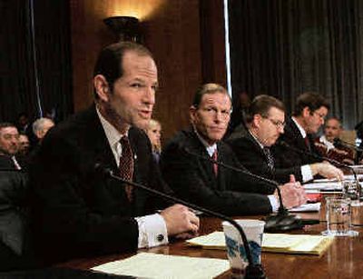 
New York Attorney General Eliot Spitzer speaks at a Senate subcommittee on Financial Management, the Budget, and International Security on Capitol Hill in Washington on Tuesday.
 (Associated Press / The Spokesman-Review)