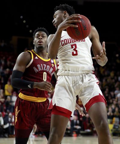 Washington State forward Robert Franks (3) rebounds as Arizona State guard Luguentz Dort (0) looks on during the first half of an NCAA college basketball game, Thursday, Feb. 7, 2019, in Tempe, Ariz. (Matt York / AP)